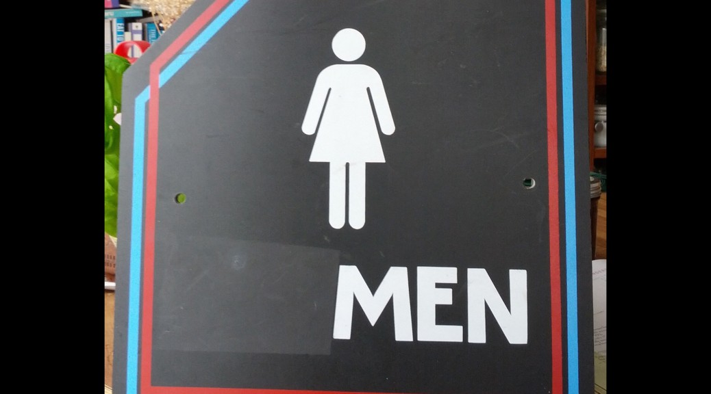 Restroom sign, altered