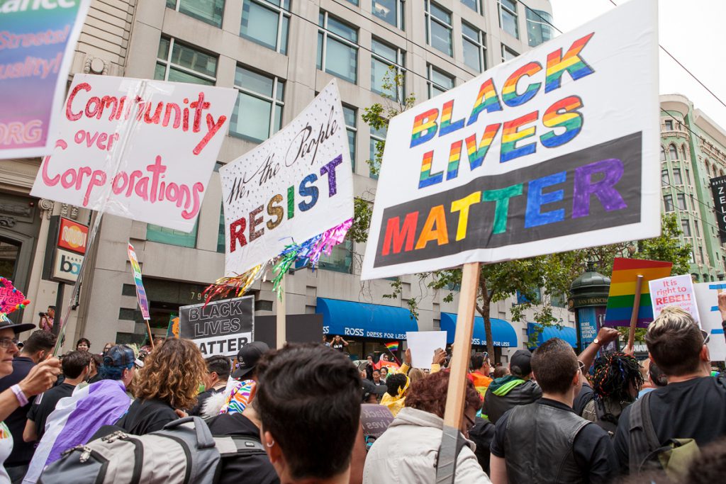 Protest signs at SF Pride